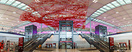 The airport's centrepiece is "Flying Carpet", a 999-metre long red alu...