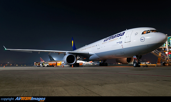 Lufthansa A330-300, D-AIKE resting on the gate after completing her journey from Munich. Air India's Star Alliance liveried B77W can be seen in the background. Airbus A330-343X