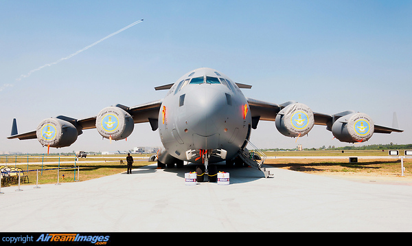 IAF's GlobeMaster on display on the ramp at Hindon AFB on the occasion of 85th Indian Air Force Day as HAL's Tejas performs a routine sortie in the backdrop. From the No. 81 Squadron "SkyLords," Indian Air Force Boeing C-17A GlobeMaster III, CB-8004. Boeing C-17A Globemaster III