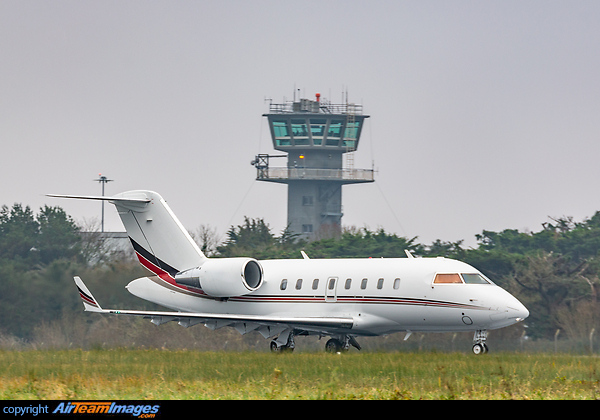 The ATC Visual Control Tower at Shannon Airport with a private Bombardier Challenger business jet in the foreground Bombardier Challenger 604