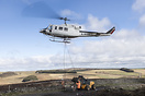 Heli lift services seen here transporting stone to the remote paths in...