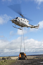 Heli lift services seen here transporting stone to the remote paths in...