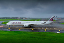 Qatari ready to depart with heavy rain showers approaching