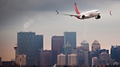 Low approach prior to landing on the delivery flight for the first 737...