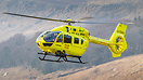 Performing a rescue mission infront of Stanage Edge in the Peak Distri...