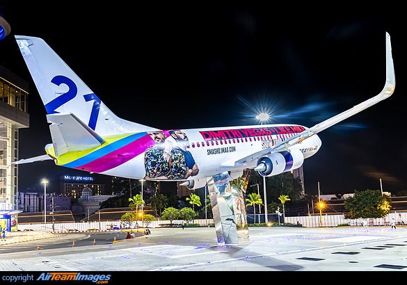 Boeing 737-300 ex Orient Thai Airlines on dispay at downtown Pattaya in front of Terminal 21 shopping mall with temporary Dimitri Vegas & Like Mike advertisement Boeing 737-3T0