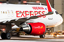 Iberia Express Airbus A320-214 preparing for pushback at night.