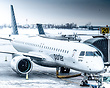 Parked at the gate in Ottawa after the inaugural E2 flight for the air...