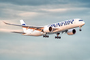 Finnair A350-900 on finals into Singapore Changi Airport whilst sun-ki...