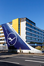 Aircraft tail in front of the Lufthansa headquarters