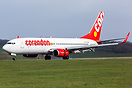 arriving from Amsterdam to take the Welsh national football team to Sp...