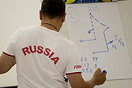 Member of the Russia team writing down their chosen figure for the fre...