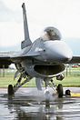 Suction created by the engine picks up water from the apron.