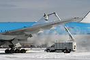 After the storm, de-icing for departure.
