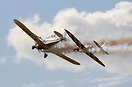 G-BDPJ towes G-IZII whilst G-TWST performs close formation manoeuvers ...
