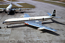 A new Comet 4 being towed passed a BOAC Stratocruiser 