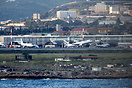 Overview of Heraklion Airport while an Aegeon Airlines Airbus A320 mak...