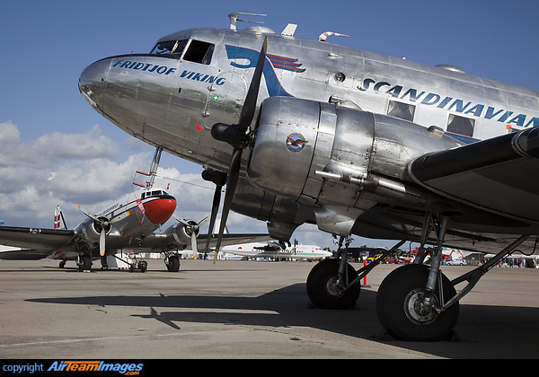 This SAS DC-3 is operated by Flygande Veteraner Sweden, pictured behind is OY-BPB operated by DC-3 Vennerne Douglas - DC-3