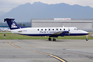 Motion blurred panning picture of a Beech 1900 from Pacific Coastal Ai...