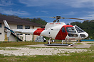 An AS350 at the Bora Bora Heliport in Vaitape waiting to operate the n...