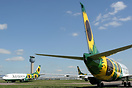 Three ex bmibaby B737s await delivery to KUBAN in a stunning sunflower...